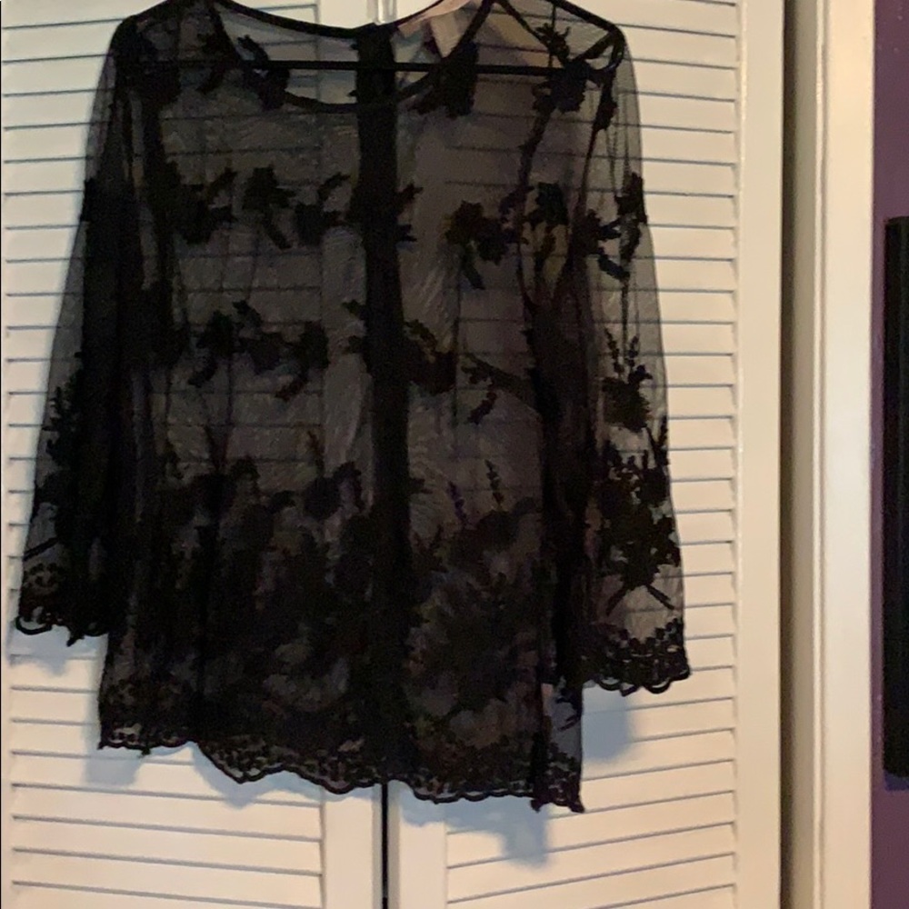 Sheer black top with button up back!